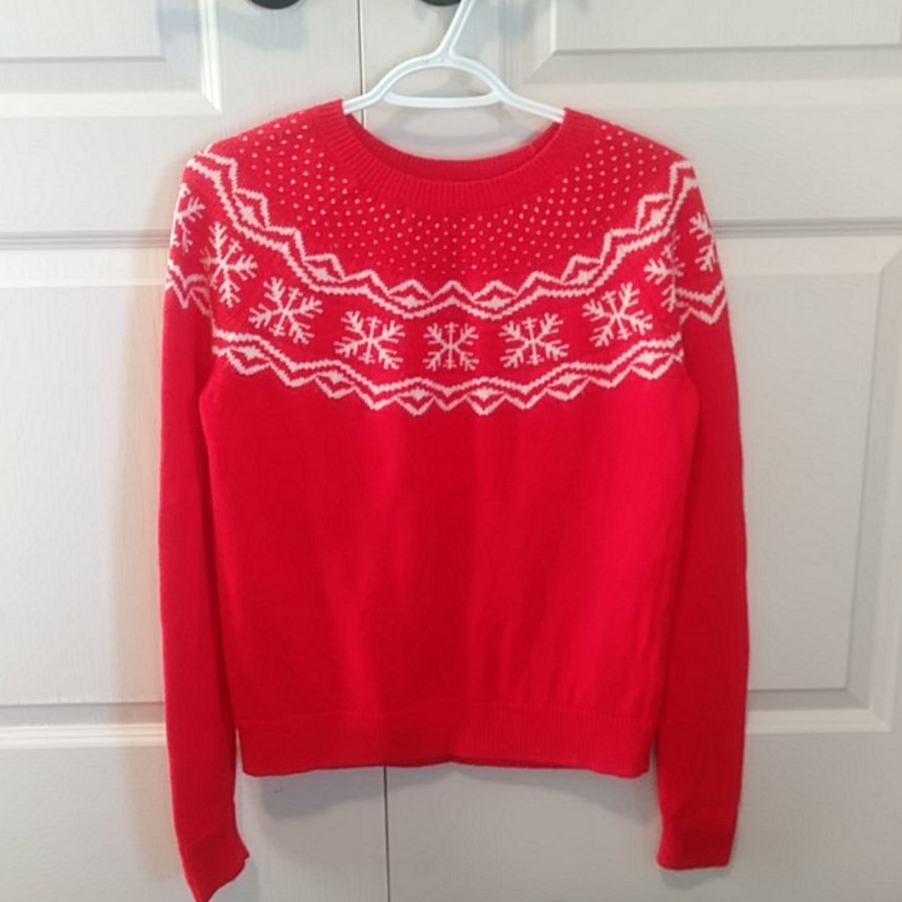 Bright red sweater
